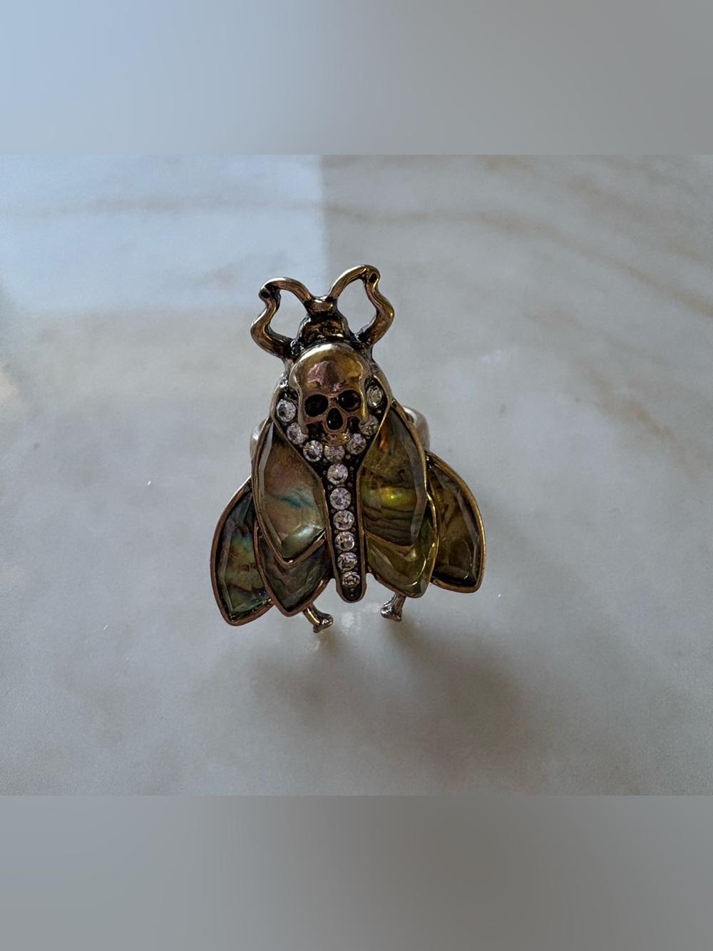 Vintage inspired Skull moth Statement Ring in Iridescent Green. Size 7